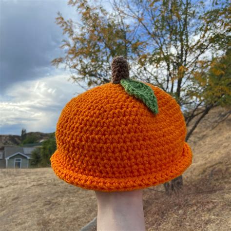 Orange Crochet Hat .